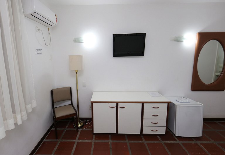 Apartamento 273 confortável em condomínio em hotel em frente
