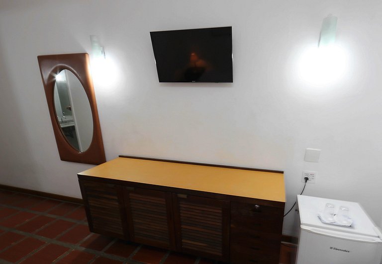 Apartamento 274 confortável em condomínio em hotel em frente